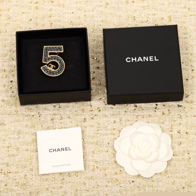 Ch*el brooches